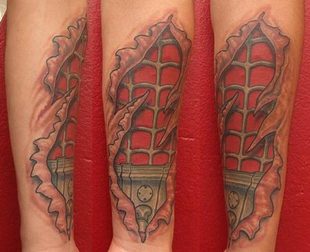 Robert Hendrickson - skin rip Spider-man web cartridge tattoo 